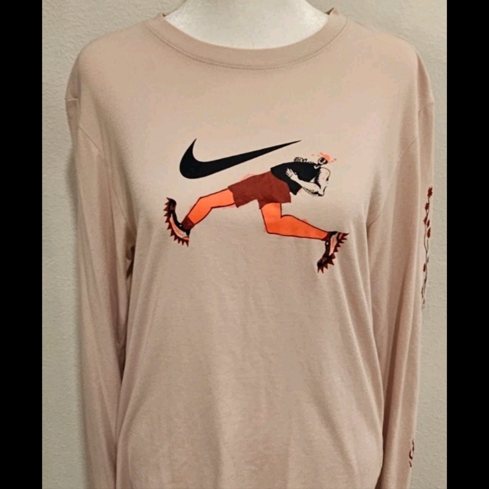 THE NIKE TEE WOMENS DRI FIT SMALL LONG SLEEVE GRAPHIC SHIRT
